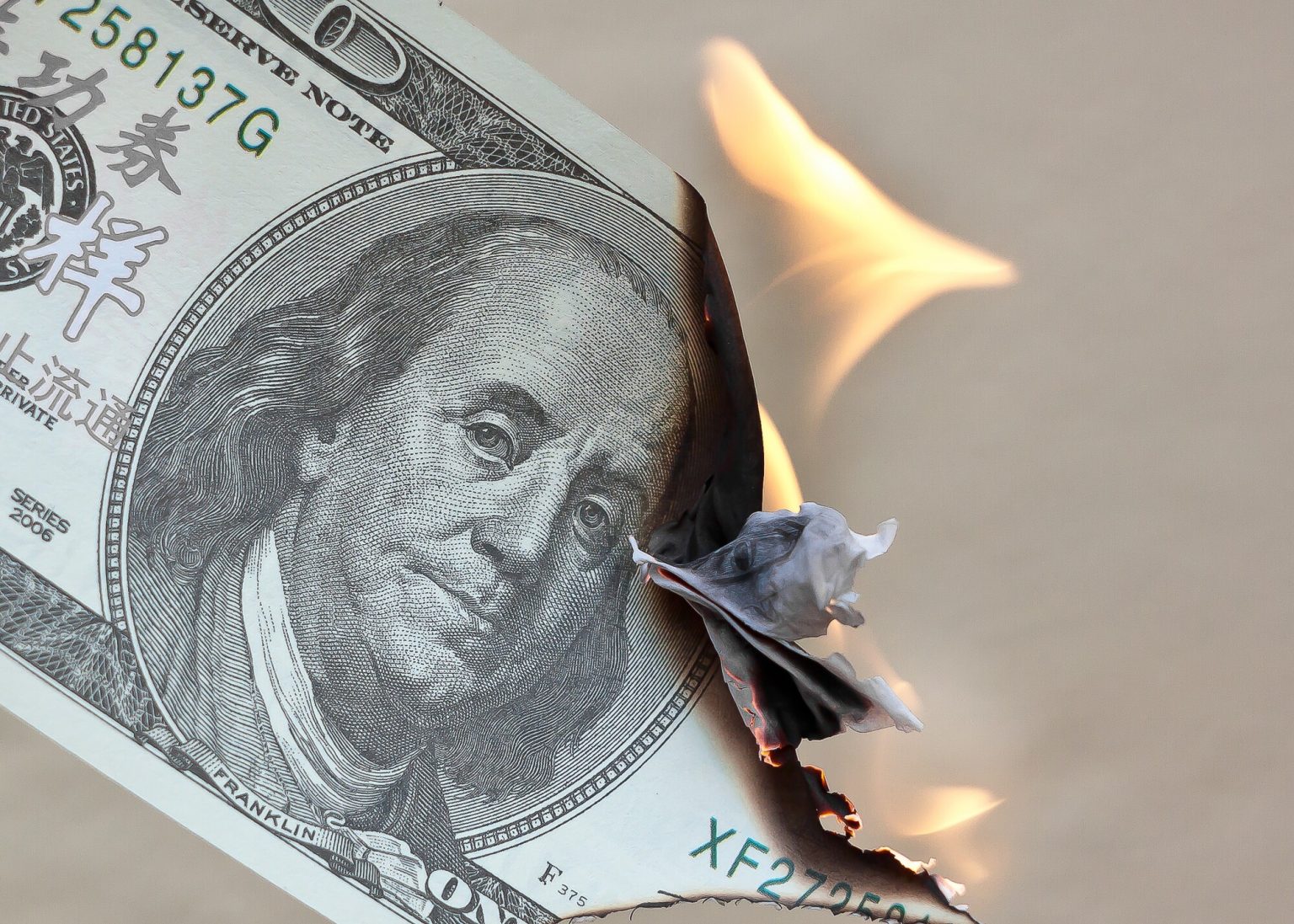  is it illegal to burn money 
